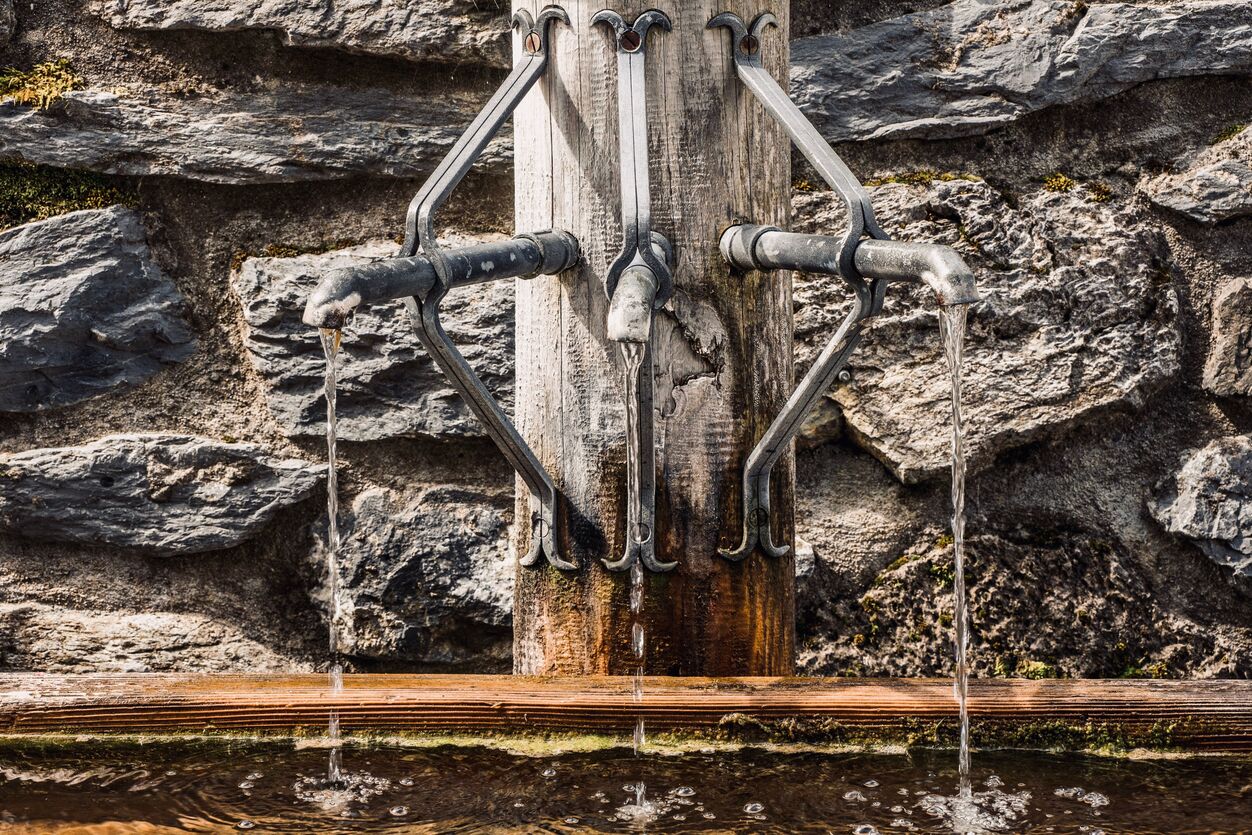 Outdoor water tap in a winter garden